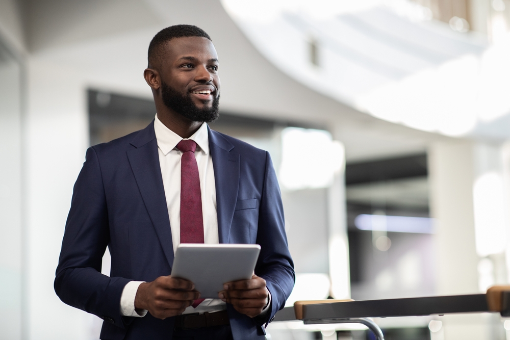 Cheerful,Young,Bearded,African,American,Man,Manager,Walking,By,Office